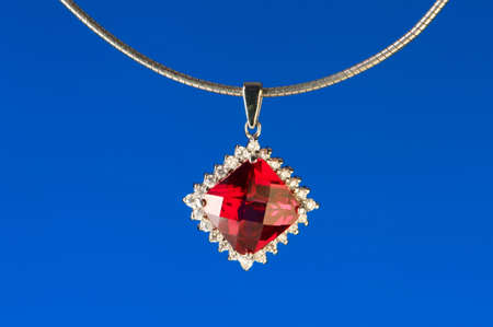 Pendant against colour gradient backgroundの写真素材