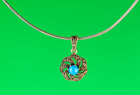 Pendant against colour gradient backgroundの写真素材