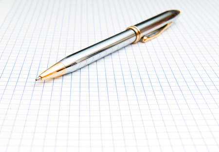 Writing pen on the blank pageの写真素材