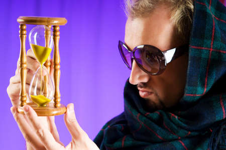 Man with glasses in studio shooting