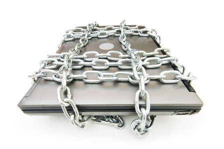 Computer security concept with laptop and chain