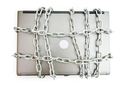 Computer security concept with laptop and chainの写真素材