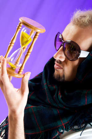 Man with glasses in studio shootingの写真素材