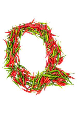 Alphabet with green and red peppers - letter の写真素材
