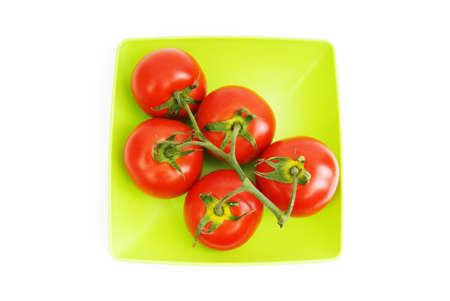 Red tomatoes isolated on the white backgroundの写真素材