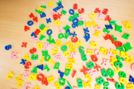 Children letters and digits on the tableの写真素材