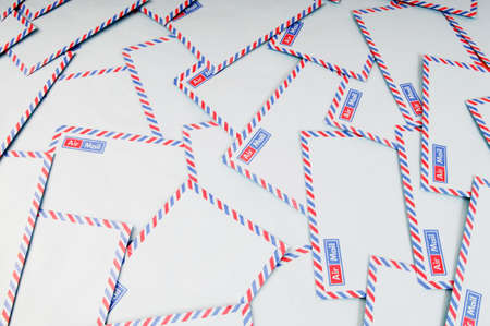 Mail concept with many envelopes on the tableの写真素材