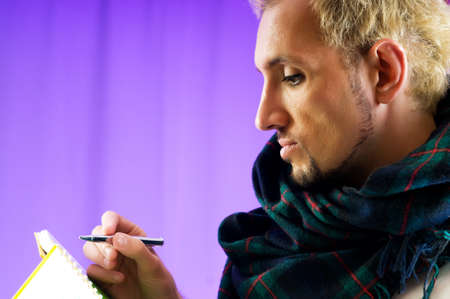 Man with glasses in studio shootingの写真素材