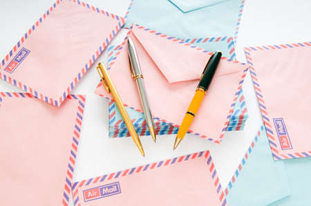 Mail concept with many envelopes on the tableの写真素材