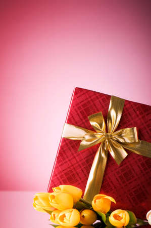 Celebration concept - gift box and tulip flowersの写真素材