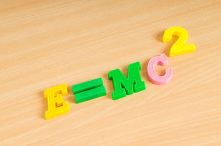 Famous einstein formula made of plastic numbersの写真素材