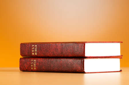 Bible books against the colorful gradient backgroundの写真素材