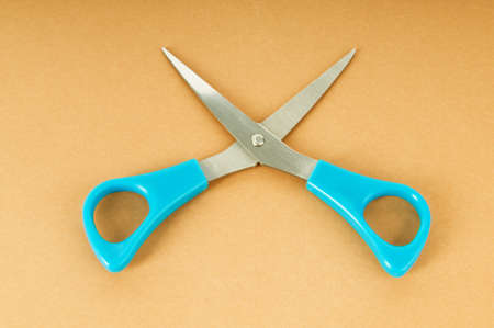 Colorful scissors on the color paper backgroundの写真素材