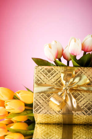 Celebration concept - gift box and tulip flowersの写真素材