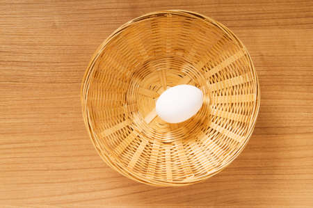 Many white eggs on the wooden tableの写真素材