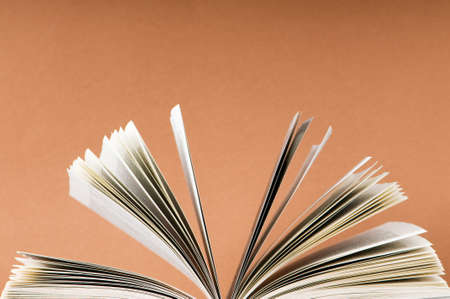 Stack of books on the color backgroundの写真素材