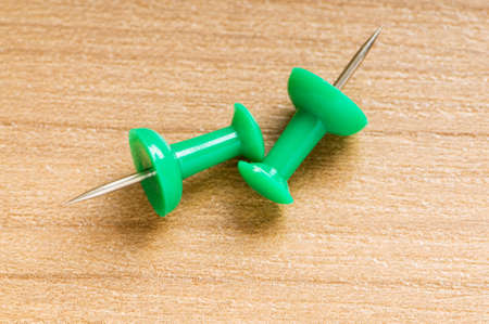 Many colourful office pins on the background の写真素材