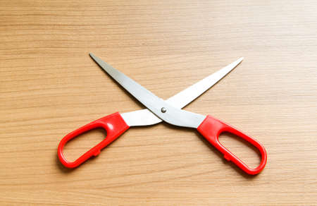 Various scissors on the wooden backgroundの写真素材