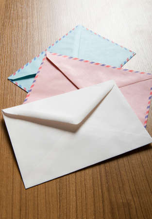 Mail concept with many envelopes on the tableの写真素材