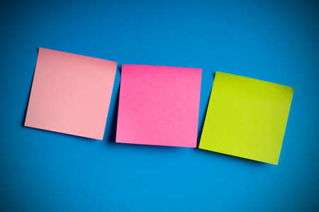 Reminder notes on the bright colorful paperの写真素材