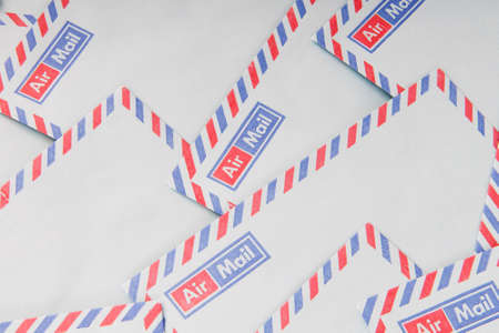 Mail concept with many envelopes on the tableの写真素材