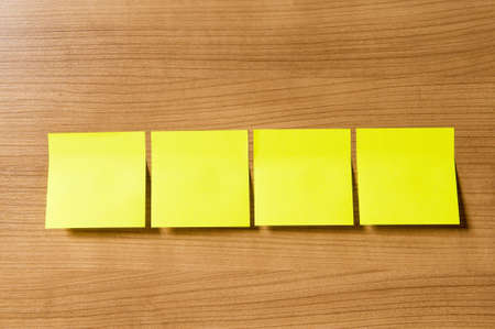 Many reminder notes on the wooden background