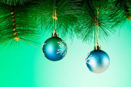 Christmas decoration against the colorful gradient backgroundの写真素材