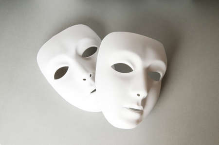 Theatre concept with the white plastic masksの写真素材