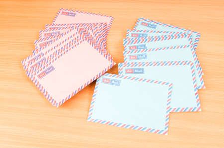 Mail concept with many envelopes on the tableの写真素材
