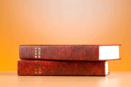 Bible books against the colorful gradient backgroundの写真素材