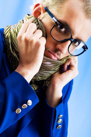 Man with blue jacket in studio shootingの写真素材