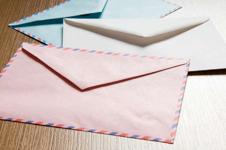 Mail concept with many envelopes on the tableの写真素材