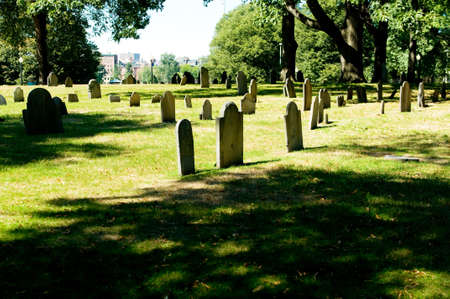 Cemetery with many tombstones on the bright dayの写真素材
