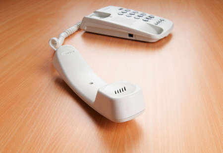 White office phone on the flat surfaceの写真素材