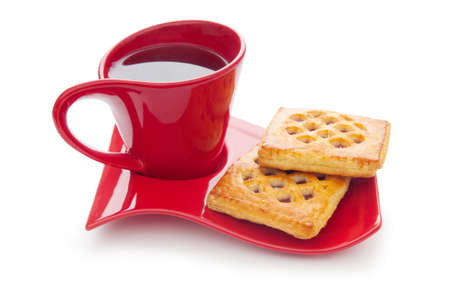 Cup of tea and fresh cookies on tableの写真素材