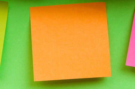 Reminder notes on the bright colorful paperの写真素材