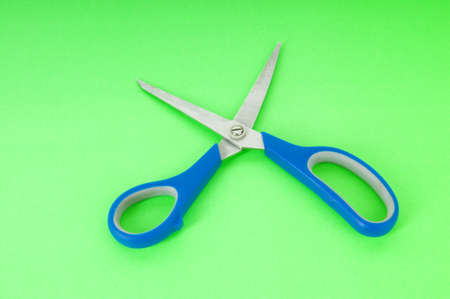 Colorful scissors on the color paper backgroundの写真素材