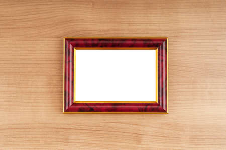 Picture frames on the polished wooden backgroundの写真素材