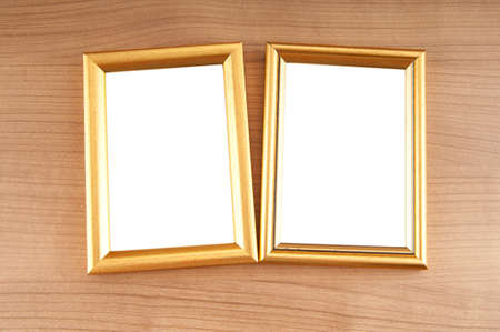 Picture frames on the polished wooden backgroundの写真素材