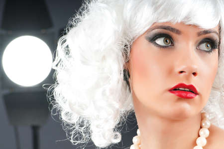 Young attractive girl with in the studio shooting