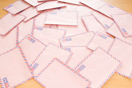Mail concept with many envelopes on the tableの写真素材