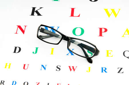 Optical reading glasses on the eyesight tableの写真素材