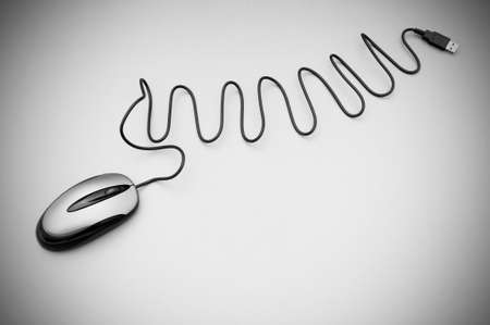 Computer mouse on the background - Technology conceptの写真素材