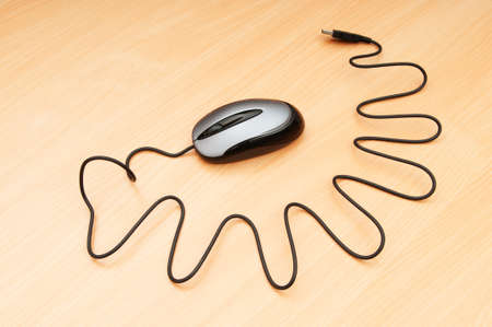 Computer mouse on the background - Technology conceptの写真素材