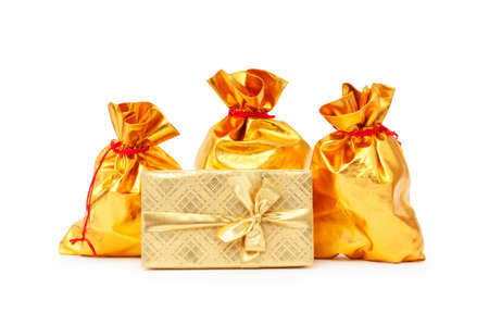 Gift boxes and golden sacksの写真素材