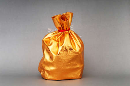 Golden sacks full of something goodの写真素材
