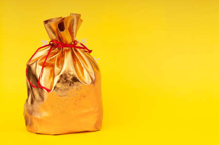 Golden sacks full of something goodの写真素材