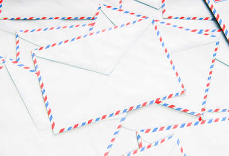 Mail concept with many envelopes on the tableの写真素材