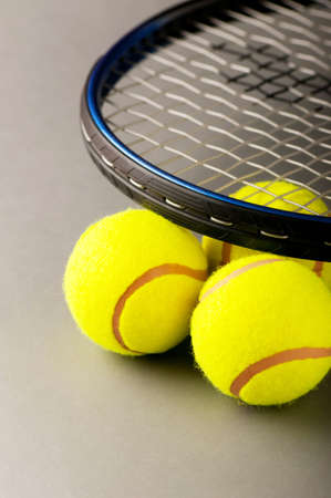 Tennis concept with balls and racket