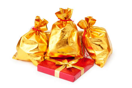 Gift boxes and golden sacksの写真素材